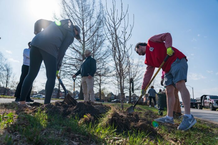 Members from the Cardinals work together.